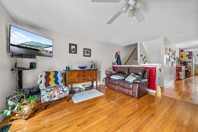 1009 Ethan Allen Dr Unit 1009, New Windsor, NY 12553 - living area featuring light wood-style flooring, a ceiling fan, stairway, and baseboards
