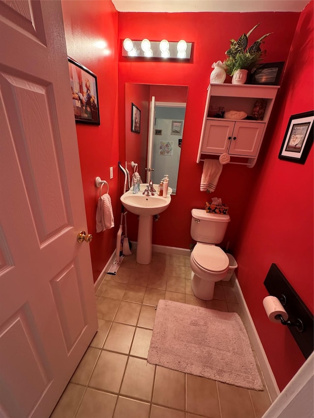 1009 Ethan Allen Dr Unit 1009, New Windsor, NY 12553 - half bath featuring toilet, tile patterned floors, and baseboards