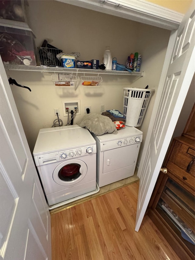 1009 Ethan Allen Dr Unit 1009, New Windsor, NY 12553 - laundry room featuring independent washer and dryer and light wood-type flooring