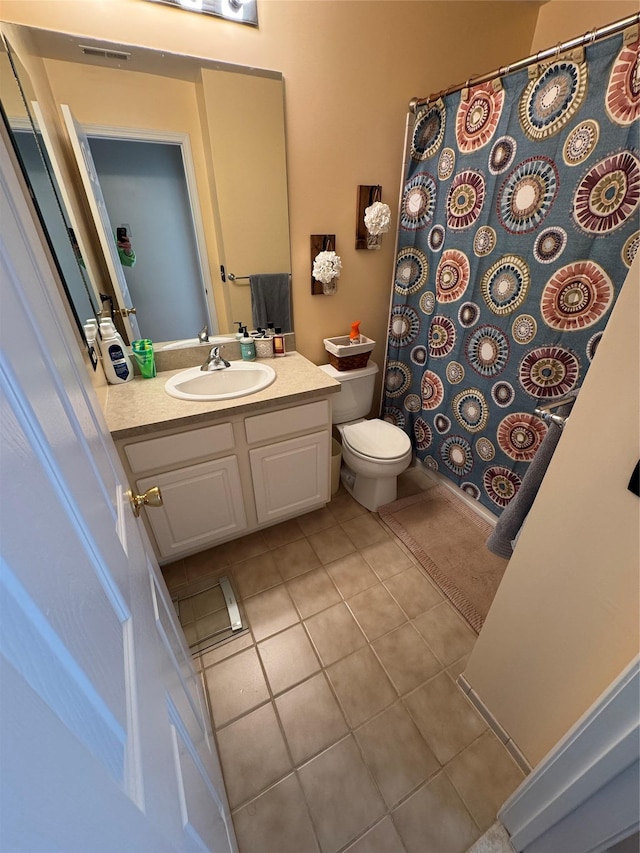 1009 Ethan Allen Dr Unit 1009, New Windsor, NY 12553 - bathroom with tile patterned flooring, vanity, toilet, and a shower with curtain