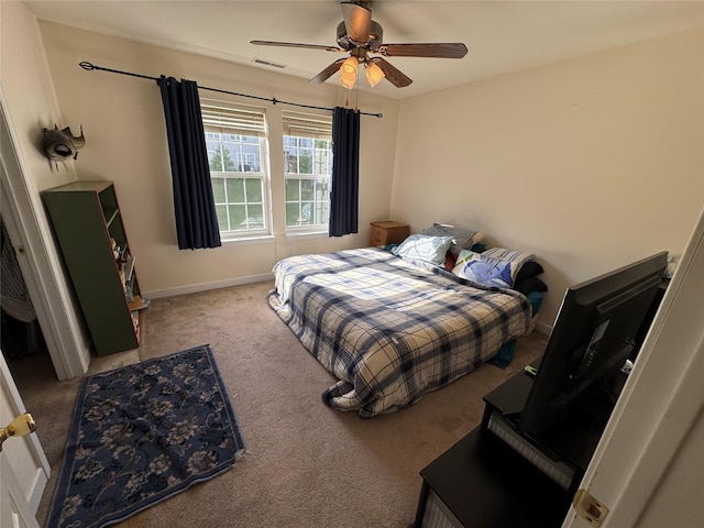 1009 Ethan Allen Dr Unit 1009, New Windsor, NY 12553 - bedroom with carpet flooring, baseboards, and a ceiling fan