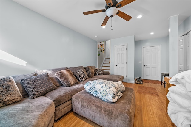 1009 Ethan Allen Dr Unit 1009, New Windsor, NY 12553 - living room with stairway, light wood finished floors, ceiling fan, and recessed lighting