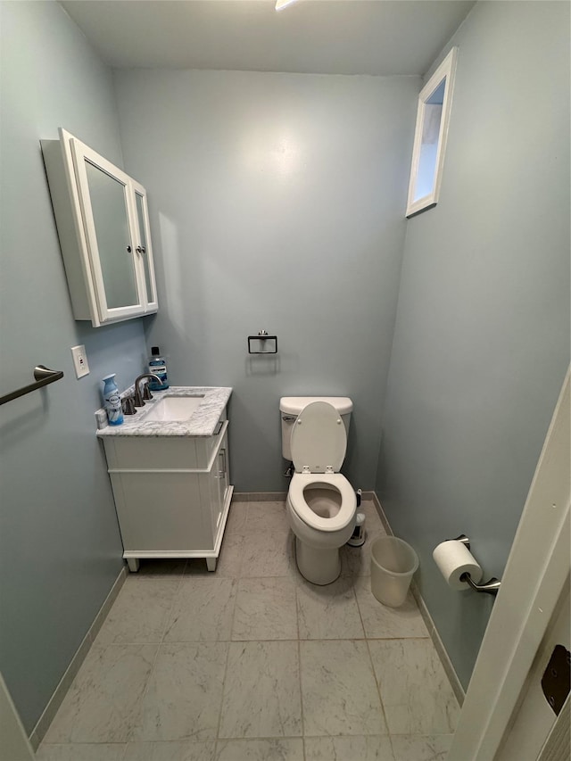 1009 Ethan Allen Dr Unit 1009, New Windsor, NY 12553 - half bath featuring marble finish flooring, baseboards, toilet, and vanity