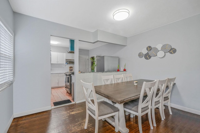 44 Juniper St, Central Islip, NY 11722 - dining area with wood finished floors and baseboards