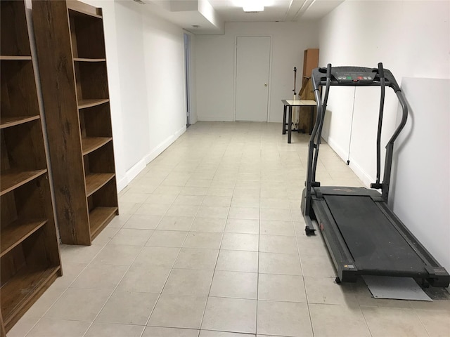 248-09 41st Ave, Little Neck, NY 11363 - workout area with light tile patterned floors and baseboards