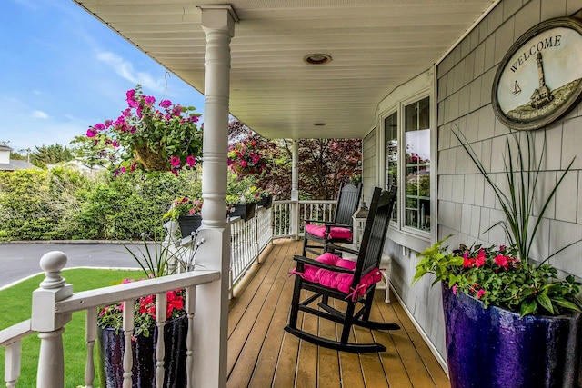 258 Timberpoint Rd, East Islip, NY 11730 - view of wooden porch