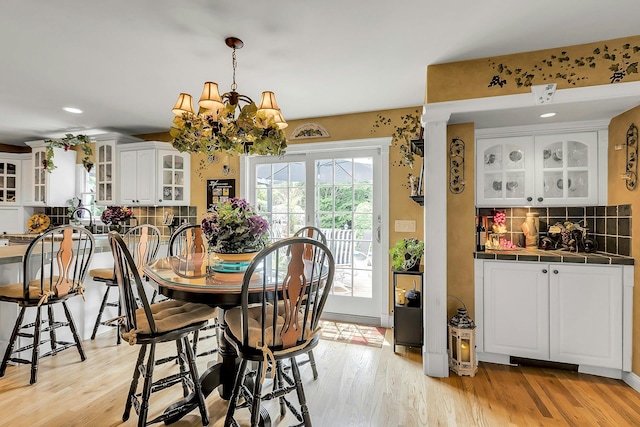 258 Timberpoint Rd, East Islip, NY 11730 - dining area featuring light wood finished floors, a chandelier, and recessed lighting