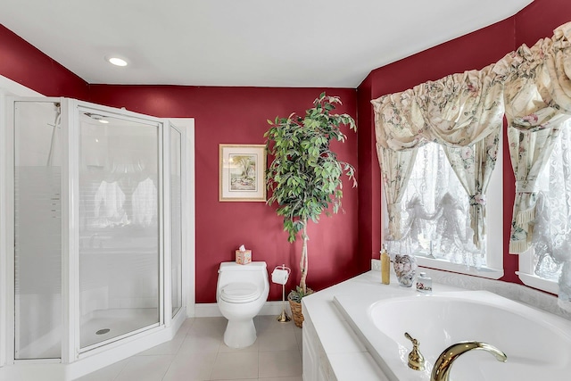 258 Timberpoint Rd, East Islip, NY 11730 - bathroom featuring a stall shower, a garden tub, toilet, and tile patterned flooring