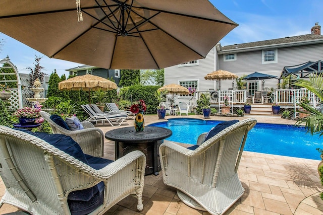 258 Timberpoint Rd, East Islip, NY 11730 - swimming pool with a patio area and a deck