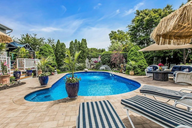 258 Timberpoint Rd, East Islip, NY 11730 - outdoor pool featuring a patio