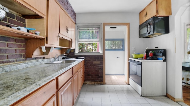 89-48 196th St, Jamaica, NY 11423 - kitchen featuring white electric range oven, black microwave, light tile patterned flooring, and open shelves