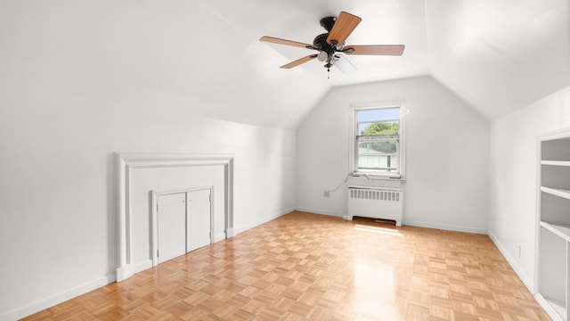 89-48 196th St, Jamaica, NY 11423 - additional living space featuring radiator heating unit, ceiling fan, and lofted ceiling