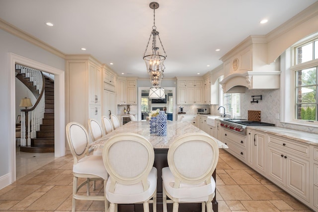 24 The Pnes, Old Westbury, NY 11568 - dining space with recessed lighting, stone tile floors, stairway, and a chandelier
