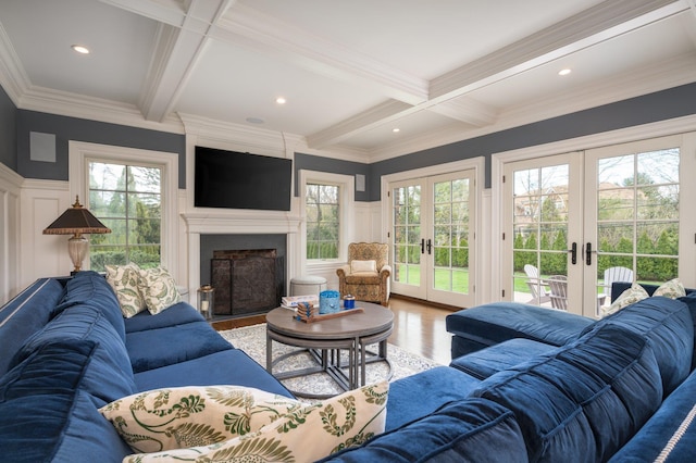 24 The Pnes, Old Westbury, NY 11568 - living area with french doors, a decorative wall, beamed ceiling, coffered ceiling, and wood finished floors