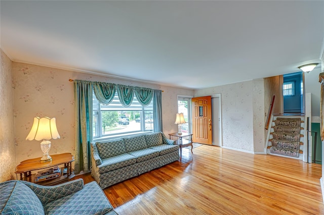 28 Chance St, Hicksville, NY 11801 - living room featuring stairs, wood finished floors, and wallpapered walls