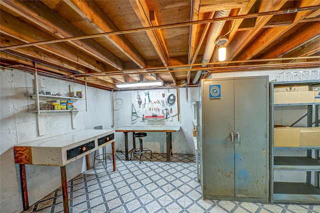 28 Chance St, Hicksville, NY 11801 - unfinished basement featuring a workshop area and tile patterned floors