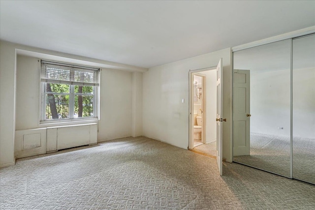 211-40 18th Ave Unit 1J, Bayside, NY 11360 - unfurnished bedroom with carpet and ensuite bathroom