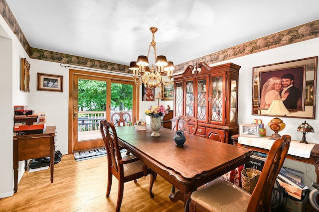 10 Catawba Dr, West Nyack, NY 10994 - dining room featuring a chandelier and light wood-type flooring