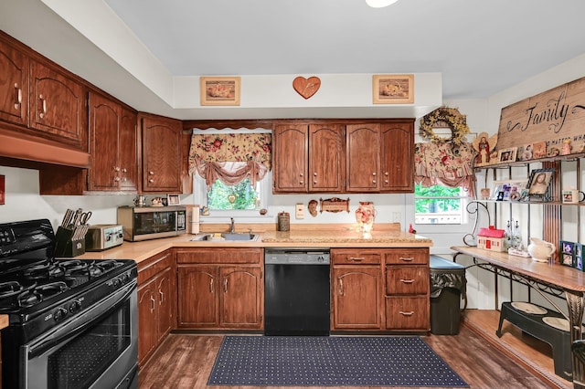 10 Catawba Dr, West Nyack, NY 10994 - kitchen featuring stainless steel appliances, a sink, dark wood-type flooring, and light countertops