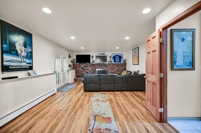 10 Catawba Dr, West Nyack, NY 10994 - living room featuring a baseboard radiator, light wood finished floors, and recessed lighting