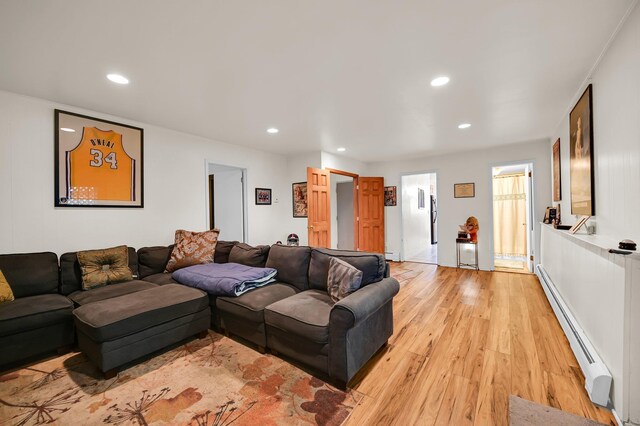 10 Catawba Dr, West Nyack, NY 10994 - living area featuring a baseboard heating unit, light wood-style floors, and recessed lighting