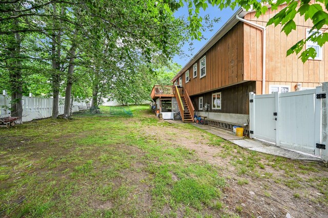 10 Catawba Dr, West Nyack, NY 10994 - view of yard featuring stairs, a deck, and a gate