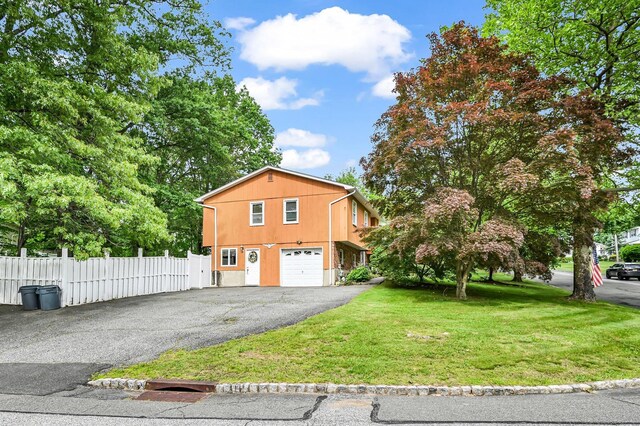 10 Catawba Dr, West Nyack, NY 10994 - view of property exterior with driveway and an attached garage