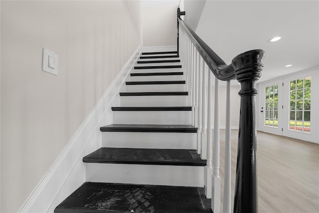 28 Snowberry Ln, Islandia, NY 11749 - staircase with recessed lighting