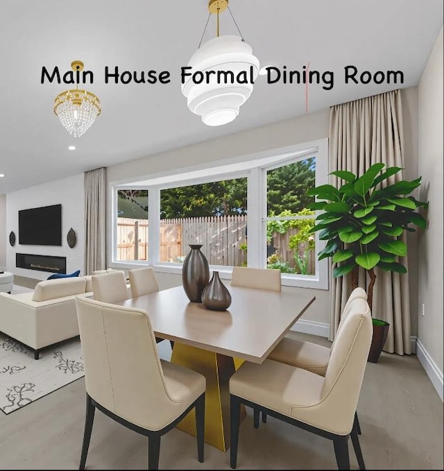 28 Snowberry Ln, Islandia, NY 11749 - dining space with recessed lighting
