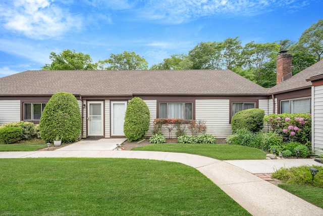 74 Gauguin Ct Unit 74, Middle Island, NY 11953 - ranch-style house with a front lawn, a shingled roof, and a chimney