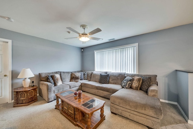 74 Gauguin Ct Unit 74, Middle Island, NY 11953 - carpeted living room featuring ceiling fan and baseboards