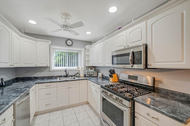 74 Gauguin Ct Unit 74, Middle Island, NY 11953 - kitchen featuring appliances with stainless steel finishes, a sink, ceiling fan, white cabinets, and recessed lighting