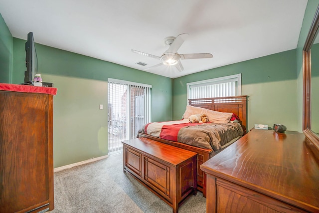 74 Gauguin Ct Unit 74, Middle Island, NY 11953 - carpeted bedroom featuring access to exterior, ceiling fan, and baseboards