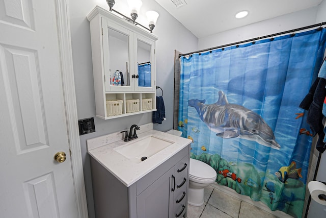 74 Gauguin Ct Unit 74, Middle Island, NY 11953 - bathroom featuring vanity, toilet, tile patterned flooring, and curtained shower