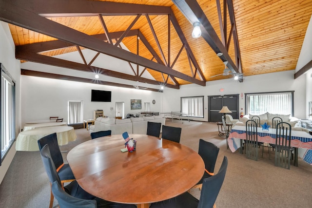 74 Gauguin Ct Unit 74, Middle Island, NY 11953 - dining area with carpet, high vaulted ceiling, and wooden ceiling with exposed beams