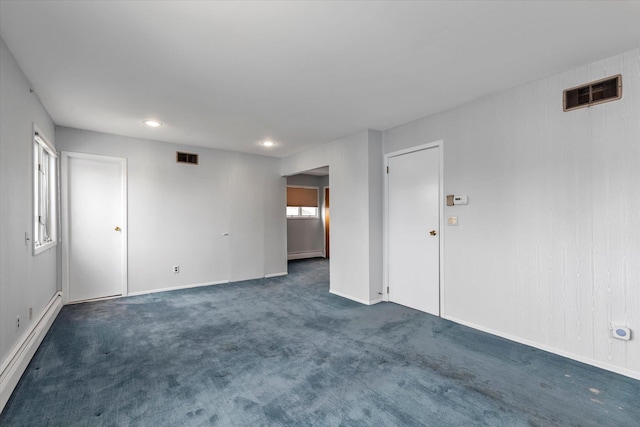 2917 Frankel Blvd, Merrick, NY 11566 - carpeted empty room featuring baseboard heating, baseboards, recessed lighting, and a baseboard heating unit