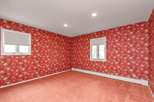 2917 Frankel Blvd, Merrick, NY 11566 - unfurnished room with a baseboard heating unit, carpet floors, recessed lighting, and baseboards