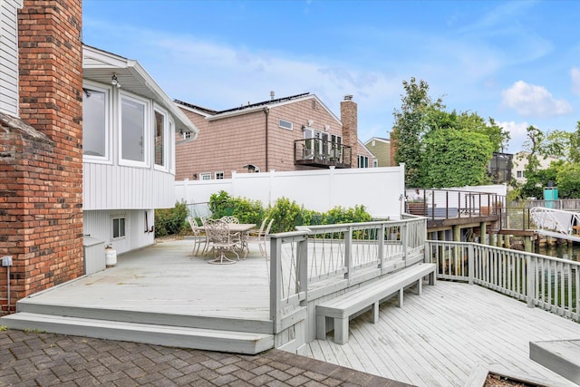 2917 Frankel Blvd, Merrick, NY 11566 - wooden terrace featuring outdoor dining space