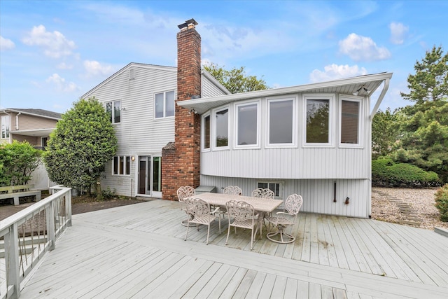 2917 Frankel Blvd, Merrick, NY 11566 - wooden terrace with outdoor dining area