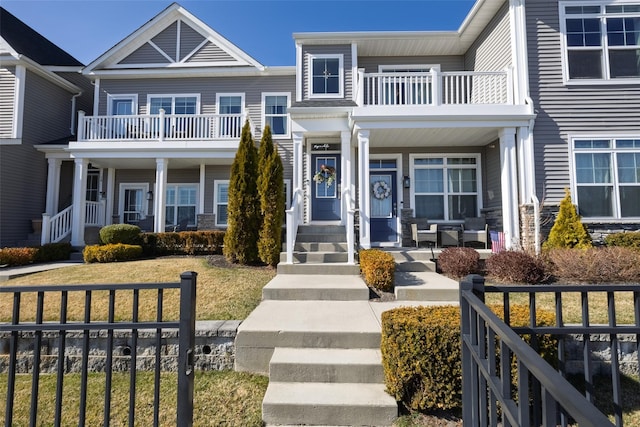 12 Grace Hall Ln, Yaphank, NY 11980 - view of front facade with a balcony and covered porch