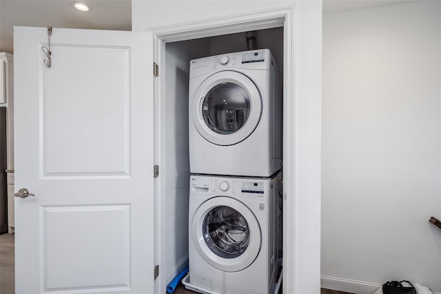 12 Grace Hall Ln, Yaphank, NY 11980 - laundry room with estacked washer and dryer and recessed lighting