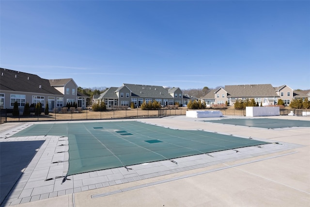 12 Grace Hall Ln, Yaphank, NY 11980 - community pool with a residential view and a patio area