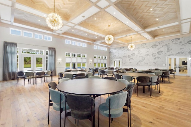 12 Grace Hall Ln, Yaphank, NY 11980 - dining area featuring a chandelier, coffered ceiling, light wood-style floors, french doors, and beamed ceiling