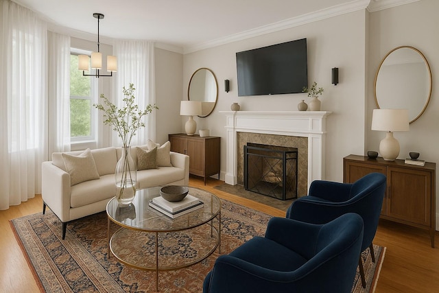 8 Barstow Rd Unit 2G, Great Neck, NY 11021 - living room featuring wood finished floors, crown molding, a fireplace with flush hearth, and a chandelier