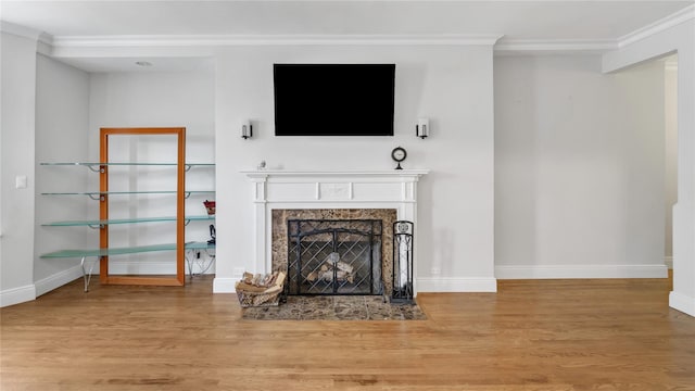 8 Barstow Rd Unit 2G, Great Neck, NY 11021 - unfurnished living room featuring crown molding, wood finished floors, a premium fireplace, and baseboards