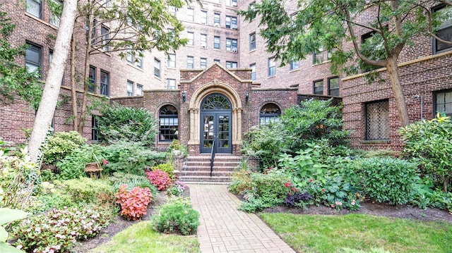 8 Barstow Rd Unit 2G, Great Neck, NY 11021 - entrance to property featuring french doors and brick siding