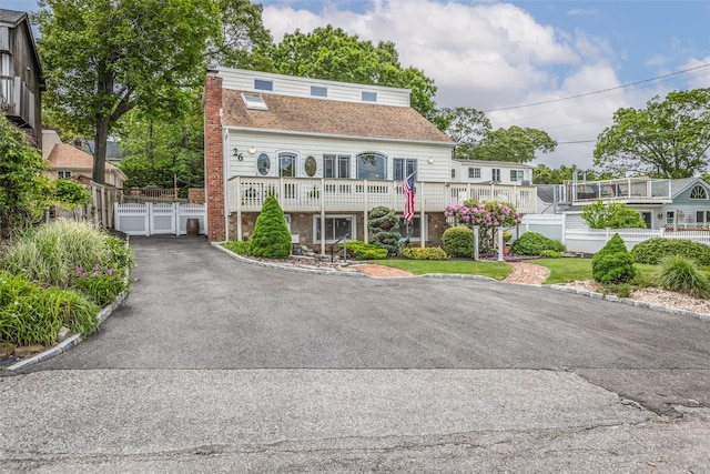 26 Point Breeze Dr, Rocky Point, NY 11778 - townhome / multi-family property featuring a chimney