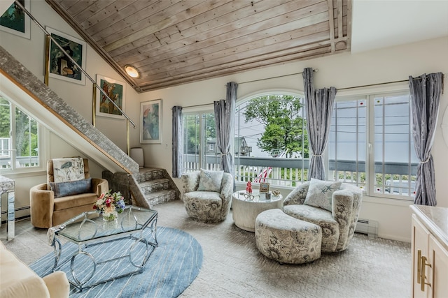 26 Point Breeze Dr, Rocky Point, NY 11778 - sunroom featuring healthy amount of natural light, lofted ceiling, and a baseboard heating unit