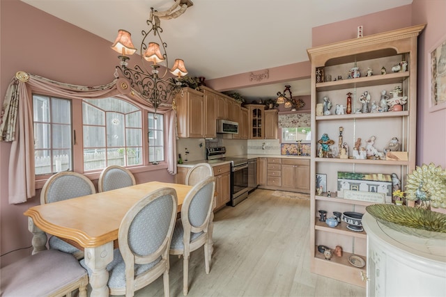 26 Point Breeze Dr, Rocky Point, NY 11778 - kitchen featuring stainless steel appliances, open shelves, and light wood-style floors