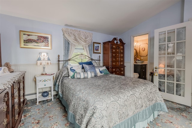 26 Point Breeze Dr, Rocky Point, NY 11778 - carpeted bedroom with wainscoting and ensuite bath